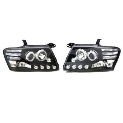 Φανάρια εμπρός για Mitsubishi Pajero (2001-2006) - μαύρα , με λάμπες (Η1) - σετ 2τμχ.